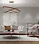 Modern oturma odasında Premium gri kanepe, beyaz koltuk, yuvarlak sehpa ve geometrik avize bulunmaktadır. Dekorda yastıklar, bir bitki ve soyut öğeler yer almaktadır. Perdeli pencere ışığı, her ayrıntıya iç mimar dokunuşu katarak şık villa havasını güçlendirir.