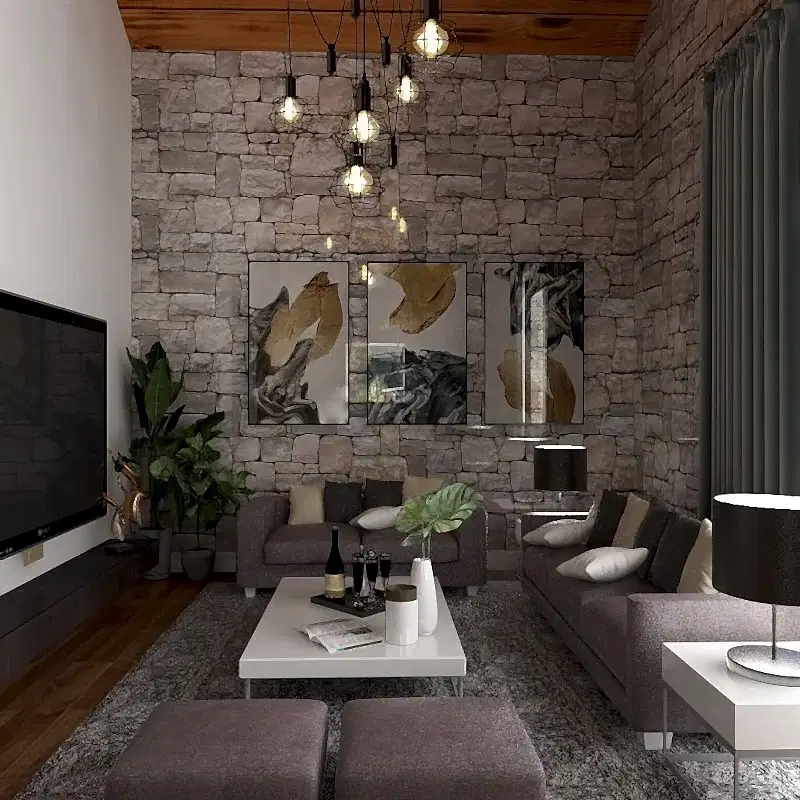 Taş duvarlı, gri kanepeli ve beyaz sehpalı bir villada modern bir oturma odası. Sarkıt ışıklar mekanı aydınlatırken, sanat eserleri ve bitkiler cazibe katıyor. Bu şık iç mimar tasarımı, her eve veya ofise davetkar ve zarif bir atmosfer getiriyor.